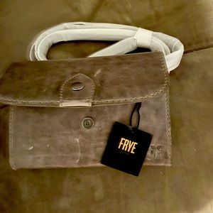 Frye clutch new. 198.00